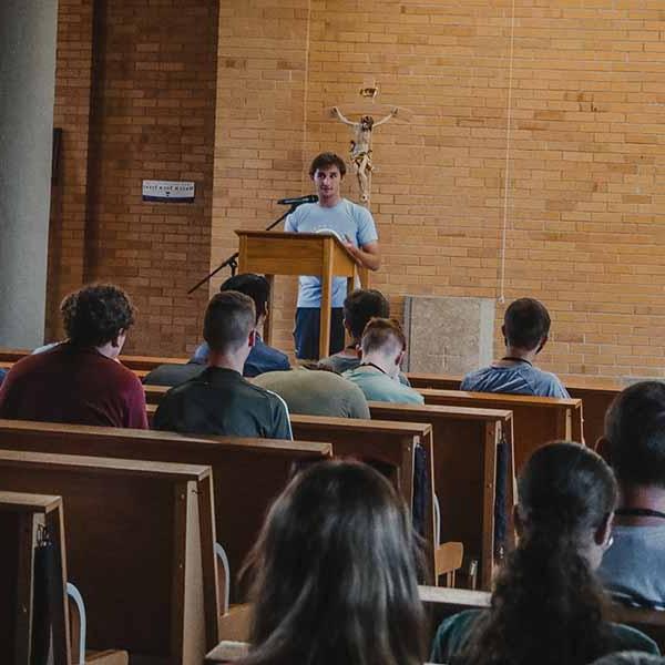 BCYC participants listen to a presentation in Guadalupe Chapel